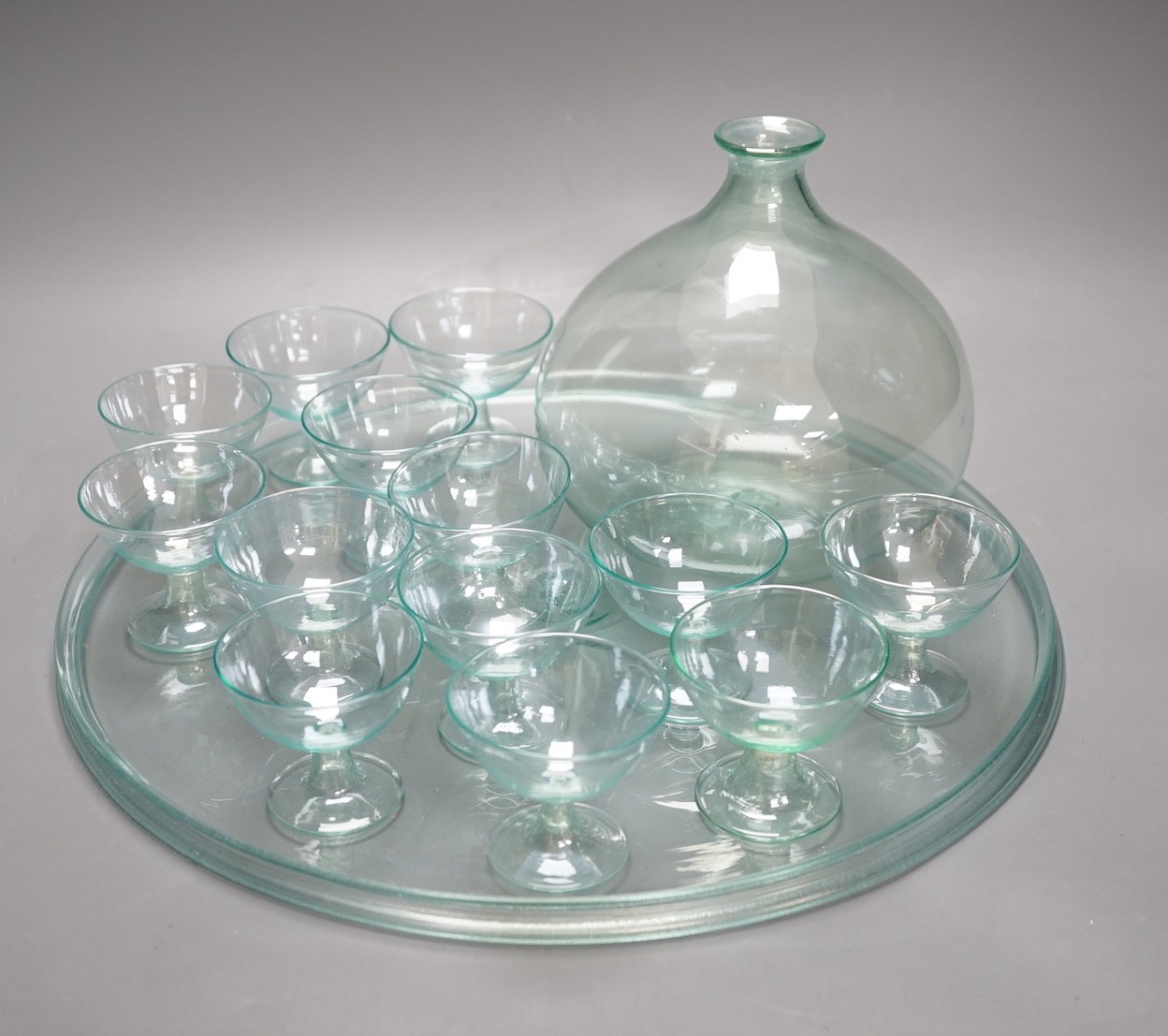 A 1930's Murano irridescent aqua glass liqueur set